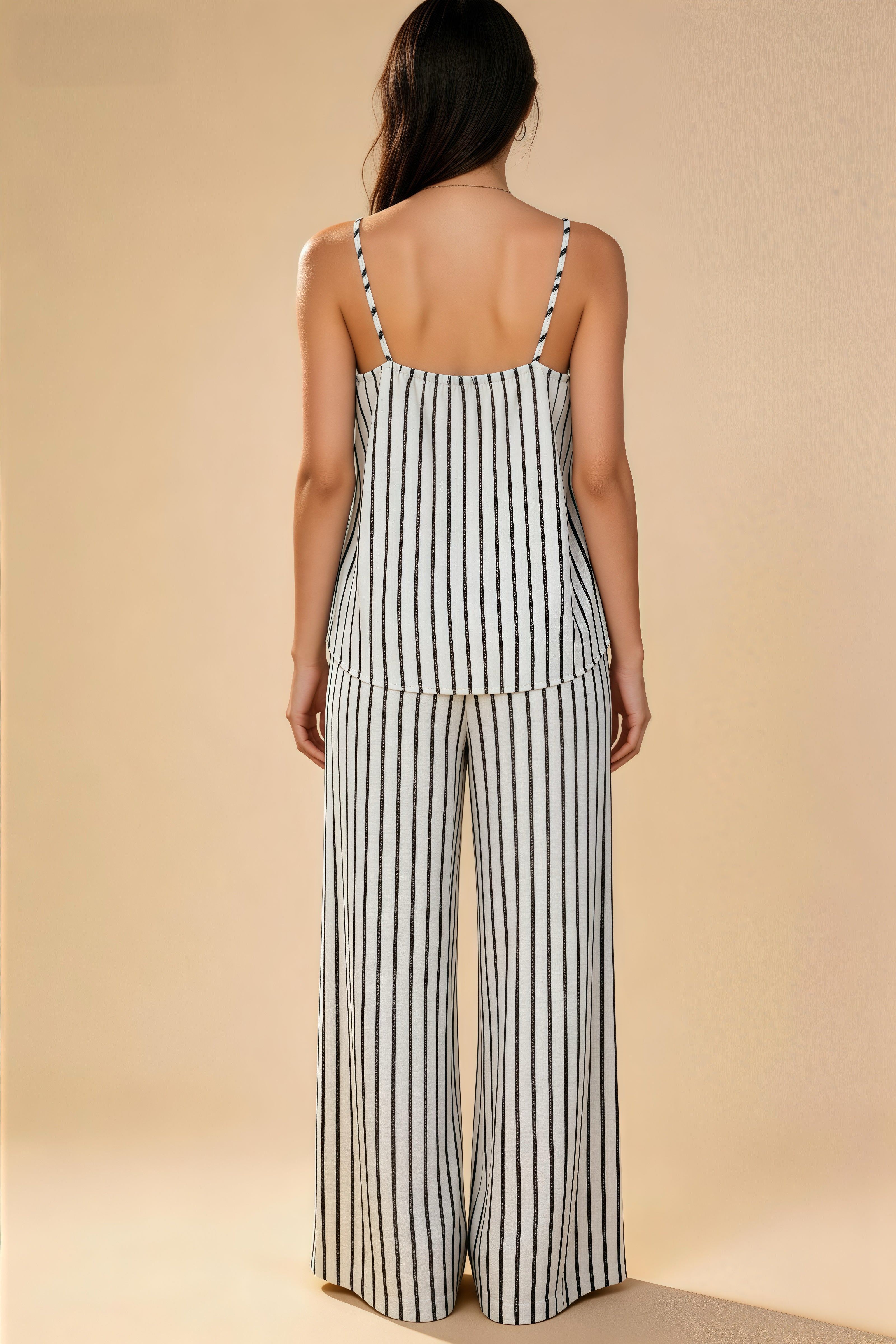 Conjunto de tirantes a rayas verticales blanco y negro clásico, pantalones anchos holgados de caída para ocio